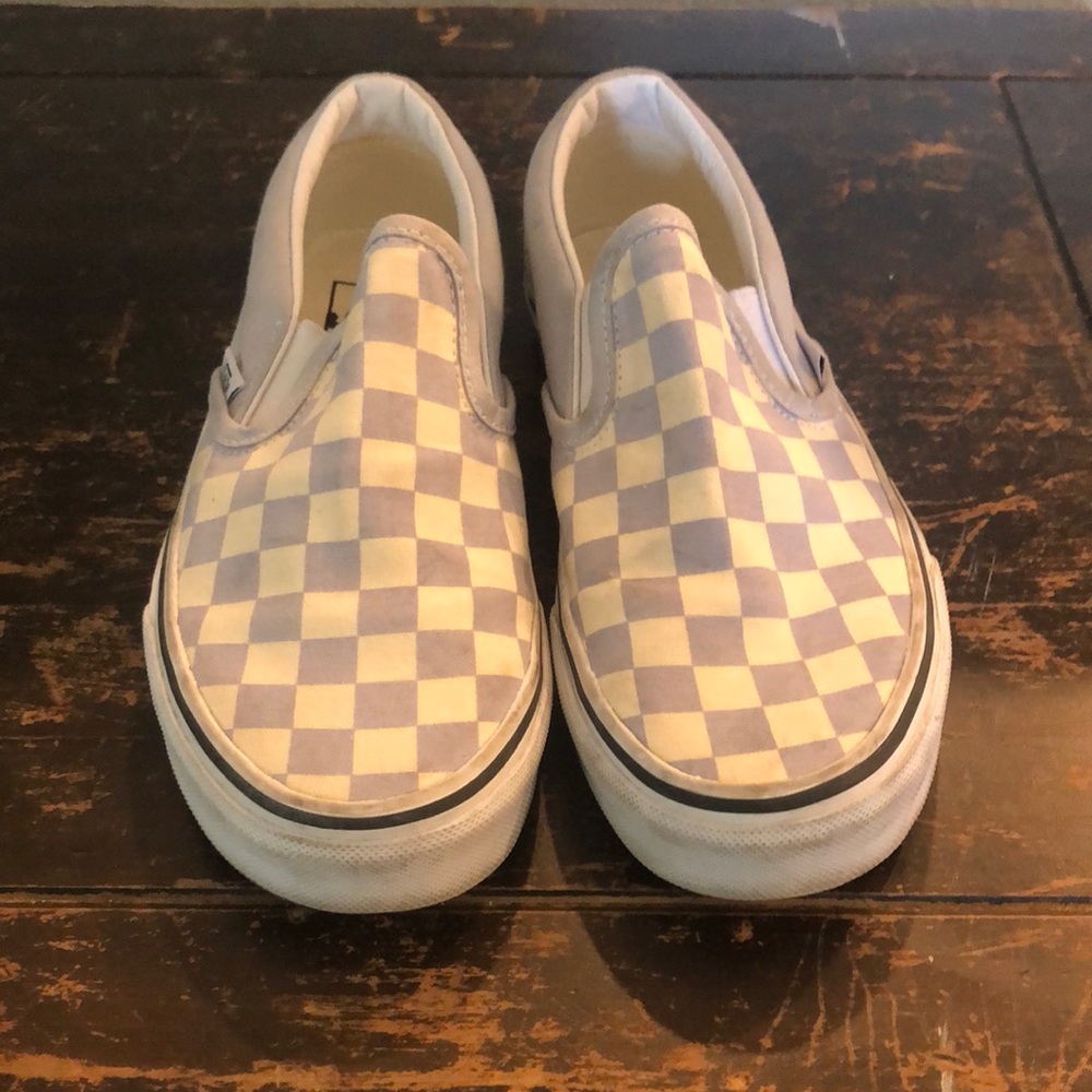 Blue and white slip on checkered vans